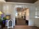 Inviting lobby with decorative chalkboard and bulletin board displaying community events, and tiled floors at 692 Augusta Rd, Winter Haven, FL 33884