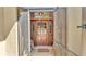 Inviting entryway featuring a wood door with glass panes, sidelights, and tiled flooring at 8621 Plantation Ridge Blvd, Lakeland, FL 33809