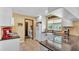 Charming kitchen featuring granite counters, white cabinetry, and an undermount sink at 8621 Plantation Ridge Blvd, Lakeland, FL 33809