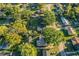 Ariel photo of home surrounded by mature trees in neighborhood at 1225 Pleasant Pl, Lakeland, FL 33801