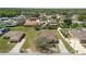 Lovely home with a spacious yard, a paved driveway, and mature trees, nestled in a peaceful and established neighborhood at 124 Brandy Chase Blvd, Winter Haven, FL 33880