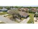 Charming home with well-maintained landscaping, a paved driveway, and mature trees, situated in a desirable neighborhood at 124 Brandy Chase Blvd, Winter Haven, FL 33880