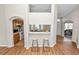 Open kitchen view with bar seating, perfect for casual dining and entertaining in this home at 124 Brandy Chase Blvd, Winter Haven, FL 33880