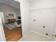 Well-lit laundry room offers convenience and a view into the living space at 124 Brandy Chase Blvd, Winter Haven, FL 33880