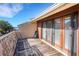 The outdoor deck has seating and overlooks a water view at 14 Casarena Ct, Winter Haven, FL 33881