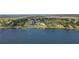 Aerial view of waterfront homes with private docks and easy access to the lake at 152 Melissa Trl, Auburndale, FL 33823