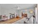 Cozy living room featuring a ceiling fan, light grey walls, modern furniture, and an open layout at 1535 Walker Rd, Lakeland, FL 33810