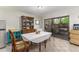 Cozy dining area with natural light, a decorative hutch, and sliding glass doors to the outdoors at 1880 N Crystal Lake Dr # 35, Lakeland, FL 33801