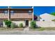 Charming townhome with well-maintained landscaping and a private entrance, perfect for comfortable living at 1880 N Crystal Lake Dr # 35, Lakeland, FL 33801