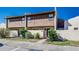 Inviting townhome featuring a private courtyard and lush greenery, offering a serene outdoor space at 1880 N Crystal Lake Dr # 35, Lakeland, FL 33801