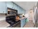 Efficient kitchen featuring classic appliances, ample cabinet space, and practical countertops at 1880 N Crystal Lake Dr # 35, Lakeland, FL 33801