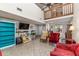 Spacious living area with a ceiling fan and balcony, ideal for relaxation and entertainment at 1880 N Crystal Lake Dr # 35, Lakeland, FL 33801
