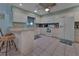Bright kitchen with white cabinets, tile flooring, and lots of natural light at 1939 Prairie Dunes N Cir, Lakeland, FL 33810
