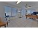 Bright office with tiled floors, neutral walls, and large windows providing ample natural light at 1939 Prairie Dunes N Cir, Lakeland, FL 33810