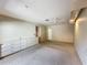 Spacious bedroom with neutral carpet, recessed lights, ceiling fan, and built in bureau at 2605 Nevada Rd, Lakeland, FL 33803