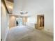 Bright room with a ceiling fan and access to an outdoor patio and doorway to another room at 2605 Nevada Rd, Lakeland, FL 33803