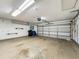 Spacious two-car garage with ample storage and an automatic door opener at 2605 Nevada Rd, Lakeland, FL 33803