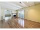This living room features hardwood floors, high ceilings, and a fireplace for a cozy ambiance at 2605 Nevada Rd, Lakeland, FL 33803