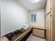 Home office with built-in desk and storage, complemented by natural light at 2605 Nevada Rd, Lakeland, FL 33803
