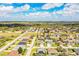 Located in a quiet neighborhood, this house features a mature lawn and landscaping, and a three-car garage at 2814 Sheldon St, Lakeland, FL 33813