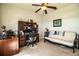 Bedroom with ceiling fan, futon, desk, and natural light at 2814 Sheldon St, Lakeland, FL 33813