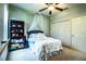 Bright bedroom featuring a floral comforter and ample closet space at 2814 Sheldon St, Lakeland, FL 33813