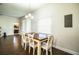 Dining room has wood floors and a window that allows natural light to illuminate the area at 2814 Sheldon St, Lakeland, FL 33813
