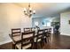 Dining room with a large table and chandelier, perfect for entertaining at 2814 Sheldon St, Lakeland, FL 33813