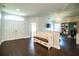 Welcoming foyer with double doors, wood floors, built-in bench and storage at 2814 Sheldon St, Lakeland, FL 33813