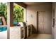 Outdoor kitchen area featuring a built-in grill, countertop space, and an access door to the home at 2814 Sheldon St, Lakeland, FL 33813