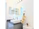 Stylish bathroom featuring modern vanity, mirror with accent lighting, and neutral decor at 300 Keswick Ave, Davenport, FL 33897