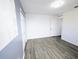 A bedroom featuring wood-look floors and a neutral paint palette, great closet space at 300 Keswick Ave, Davenport, FL 33897