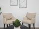 Sitting area highlighting chairs with accent pillows, table, and decorative artwork at 300 Keswick Ave, Davenport, FL 33897