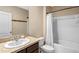Bathroom featuring a large vanity and a shower and tub combo at 301 St Georges Cir, Eagle Lake, FL 33839