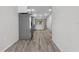 Spacious kitchen with laminate flooring and stainless steel refrigerator at 302 Ave P Nw, Winter Haven, FL 33881