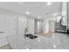 Open kitchen featuring granite countertops, stainless steel appliances, and a double basin sink at 302 Ave P Nw, Winter Haven, FL 33881