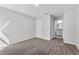 Bedroom with a neutral carpet and walk-in closet access at 304 Ave P Nw, Winter Haven, FL 33881