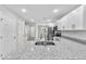 Modern kitchen features stainless steel appliances, granite countertops, and ample cabinet space at 304 Ave P Nw, Winter Haven, FL 33881