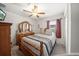 Well lit bedroom with a large window, closet and comfortable double bed at 3137 Winchester Estates Loop, Lakeland, FL 33810