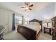 Bedroom featuring classic wooden furniture, soft carpet and an abundance of light at 3137 Winchester Estates Loop, Lakeland, FL 33810