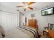 Comfortable bedroom with a large closet and TV at 3137 Winchester Estates Loop, Lakeland, FL 33810