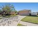A single Gathering home with a two car garage and a well manicured front yard at 3137 Winchester Estates Loop, Lakeland, FL 33810