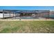 This fenced backyard features a screened pool and landscaping at 3137 Winchester Estates Loop, Lakeland, FL 33810