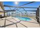 Enjoy the outdoors with a screened-in pool and spacious patio at 3137 Winchester Estates Loop, Lakeland, FL 33810