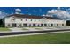 New two-story townhomes boast classic architectural details and private parking spaces for each unit at 317 Wharf Way, Winter Haven, FL 33881