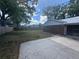 Fenced backyard shows spacious lawn and easy access to home at 330 W Wellington Dr, Lakeland, FL 33813