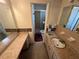 Classic bathroom with vanity, mirror, and walk-in shower at 330 W Wellington Dr, Lakeland, FL 33813