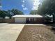 This lovely home has a detached garage and driveway to accommodate parking needs at 330 W Wellington Dr, Lakeland, FL 33813