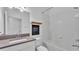 Cozy bathroom with shower/tub combination, decorative wall art and single vanity at 3919 Vista Trace Way, Lakeland, FL 33810