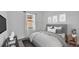 Bedroom featuring a large window, television, and modern décor at 3919 Vista Trace Way, Lakeland, FL 33810